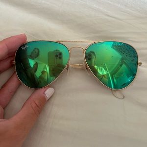 Green RayBans very scratched